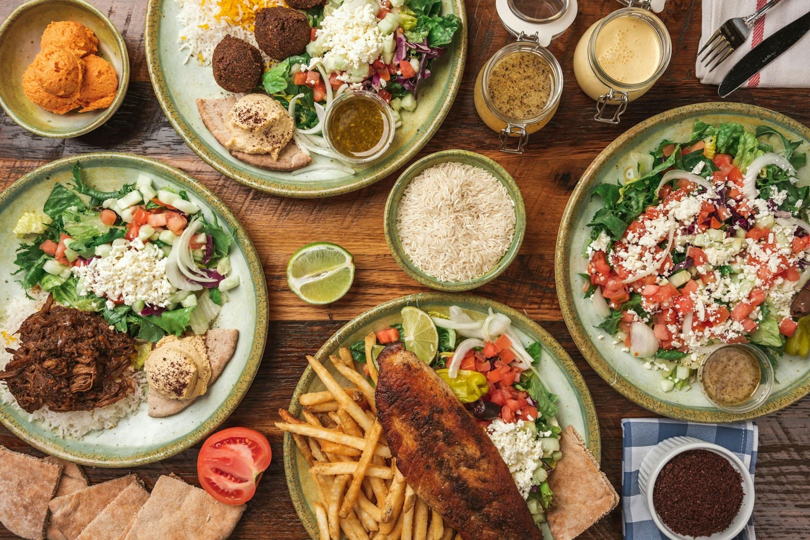 A spread of Mediterranean mezze dishes on a table